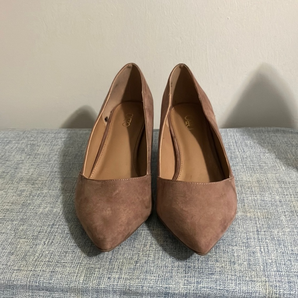 Brown Suade material heels. They are very stylish and comfortable